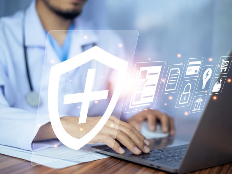 Editorial illustration of a small business leadership team reviewing cybersecurity risks on a screen while an IT professional explains protection priorities in a modern office.